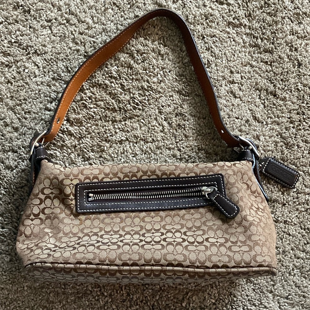 Small vintage coach purse.